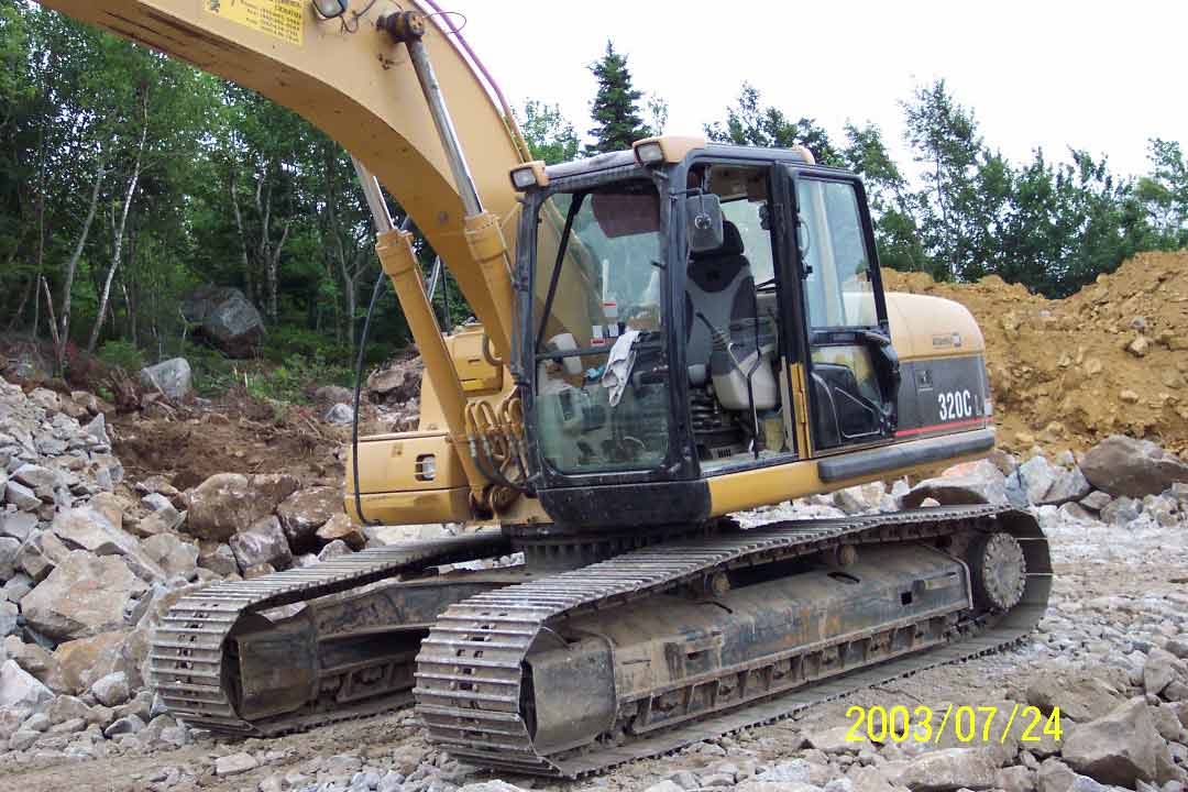 Cat 320 winshield install, on site